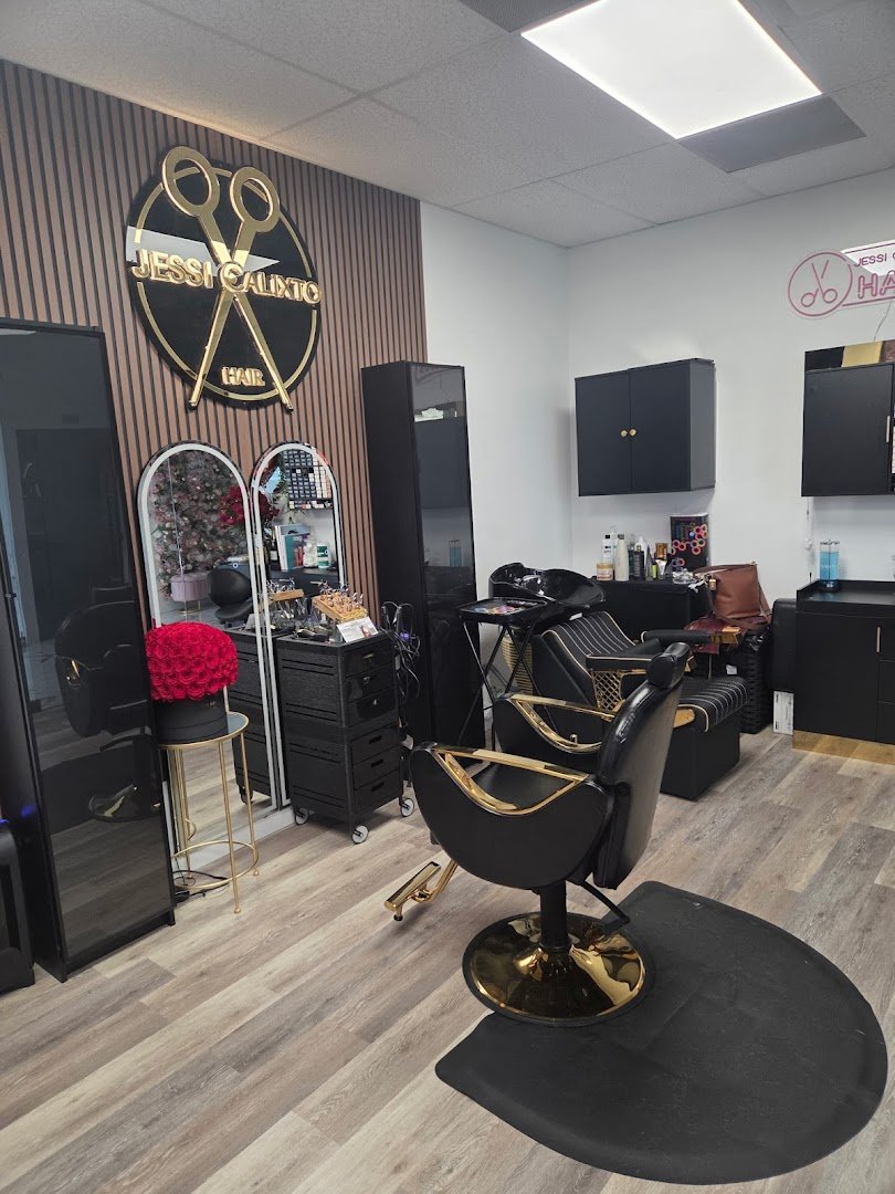 Stylist working on a client’s haircut