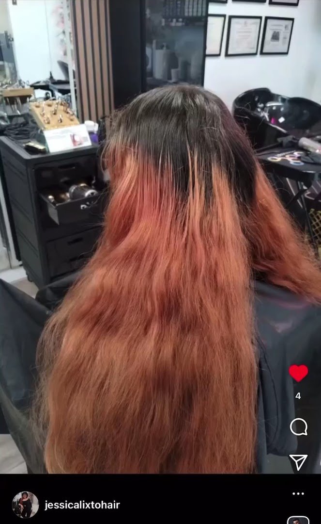 Stylist working on a client’s haircut